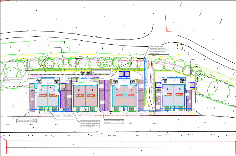 Architectural site plan showing layout of multiple residential buildings with detailed annotations and landscaping.